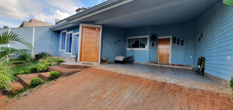 Casa de condomínio à venda Centro com 160m² e 3 quartos por R$ 450.000 - 554917260-garagem-e-entrada-sala.jpeg