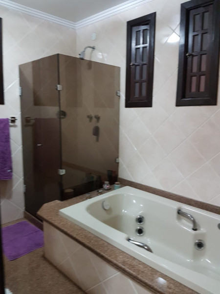 Casa de condomínio à venda Taquara com 215m² e 3 quartos por R$ 920.000 - 1966453327-foto-2-banheiro-suite.jpg