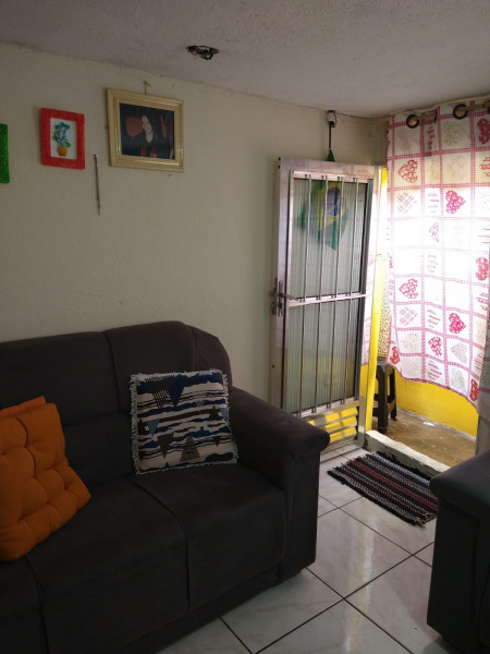 Casa à venda Jardim Copacabana com 130m² e 3 quartos por R$ 180.000 - 411398716-sala-1.jpeg