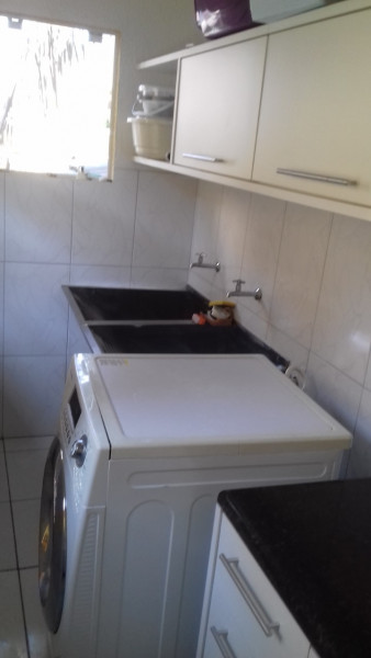 Casa de condomínio à venda Uberaba com 235m² e 4 quartos por R$ 1.825.000 - 530901170-lavanderia-ext.jpg