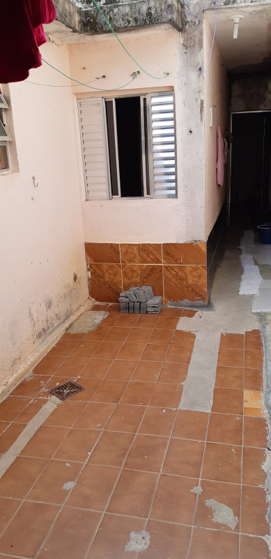 Casa à venda Jardim das Rosas (Zona Sul) com 125m² e 2 quartos por R$ 280.000 - 687514166-foto1-quintal-dos-fundos.jpg