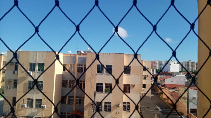 Apartamento à venda Luzia com 98m² e 4 quartos por R$ 235.000 - 1446904708-foto-area-externa.jpg