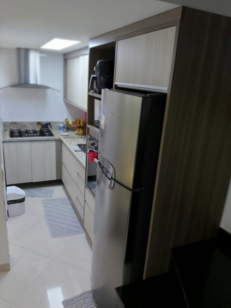 Casa de condomínio à venda Vila Carmosina com 65m² e 2 quartos por R$ 330.000 - 1329107987-cozinha-1.jpeg