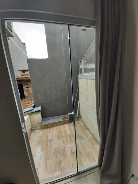 Casa de condomínio à venda Vila Carmosina com 65m² e 2 quartos por R$ 330.000 - 1650577782-foto-area-segundo-quarto.jpeg