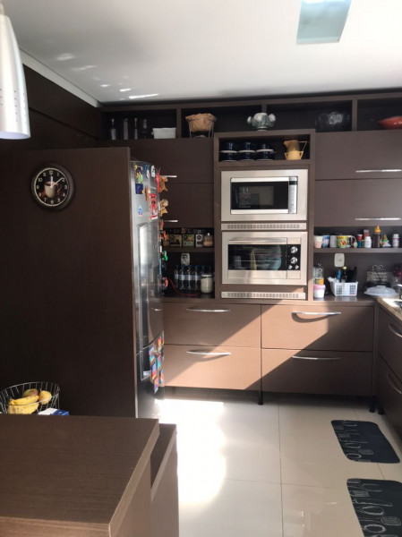 Casa de condomínio à venda Sarandi com 208m² e 3 quartos por R$ 1.200.000 - 1201185963-cozinha-2.jpg