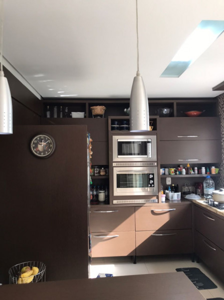 Casa de condomínio à venda Sarandi com 208m² e 3 quartos por R$ 1.200.000 - 1885457311-cozinha1.jpg