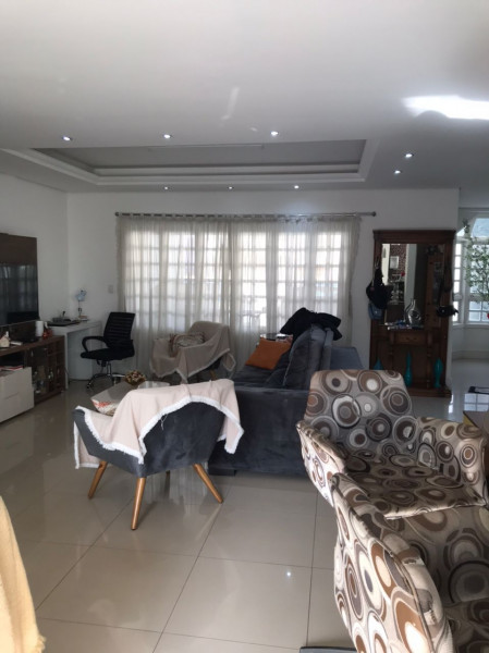 Casa de condomínio à venda Sarandi com 208m² e 3 quartos por R$ 1.200.000 - 2132898330-sala-de-estar.jpg