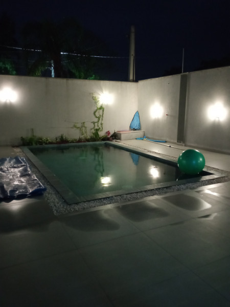 Casa à venda Praia do Estaleiro com 296m² e 3 quartos por R$ 2.850.000 - 677575475-foto-piscina.jpg