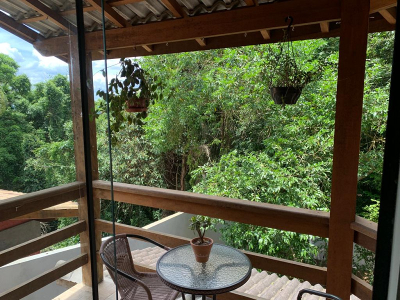 Casa de condomínio à venda Transurb com 276m² e 3 quartos por R$ 950.000 - 1819103390-29-varanda-da-sala-de-jantar.jpeg