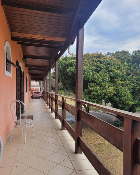 Casa à venda Parque Res. Uniao com 182m² e 4 quartos por R$ 600.000 - 2052950684-sacada-lateral.jpeg