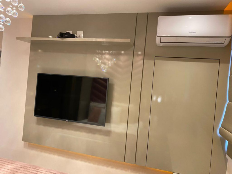 Apartamento à venda Centro com 48m² e 2 quartos por R$ 670.000 - 1268373135-painel-tv-suite.jpeg