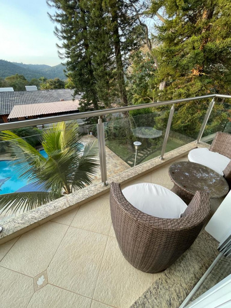 Casa de condomínio à venda Centro com 460m² e 5 quartos por R$ 4.800.000 - 2056889703-varandasuitemaster.jpeg