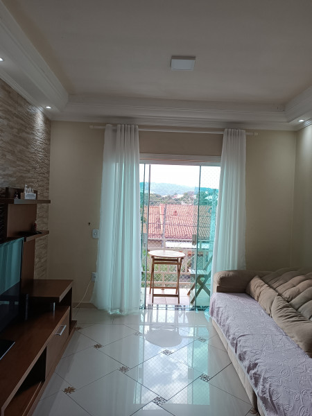 Casa de condomínio à venda Lenheiro com 190m² e 3 quartos por R$ 850.000 - 1383630379-sala.jpg