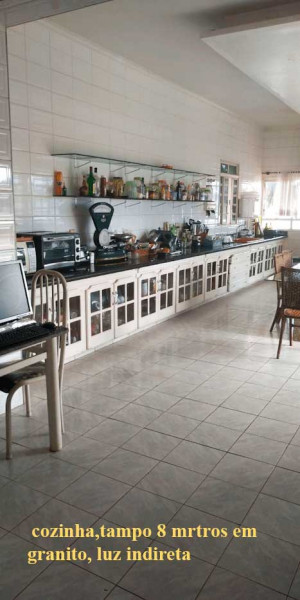 Casa à venda Jardim Aeroporto com 664m² e 4 quartos por R$ 2.360.000 - 1340104368-cozinha.jpg