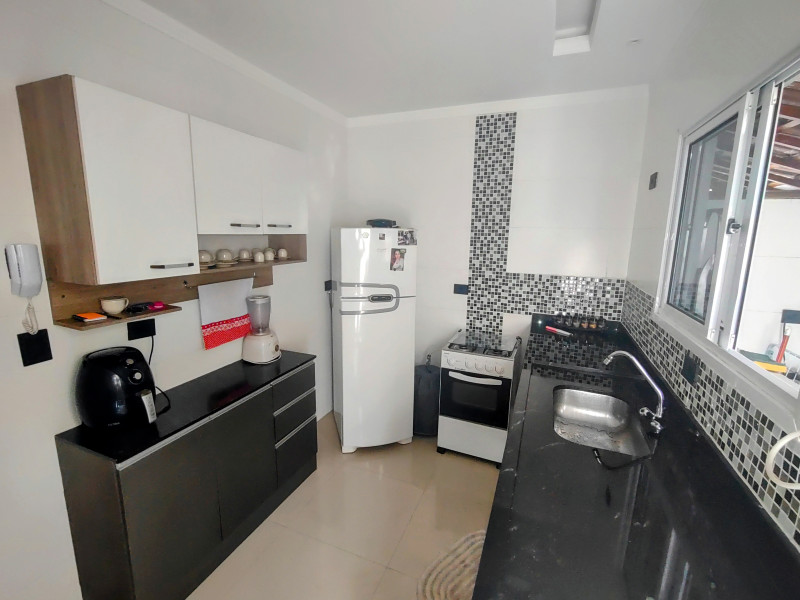 Casa de condomínio à venda Cidade Ocian com 55m² e 2 quartos por R$ 290.000 - 1390858179-cozinha-1.jpg