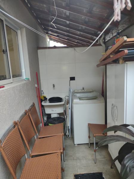 Casa de condomínio à venda Cidade Ocian com 55m² e 2 quartos por R$ 290.000 - 1921491714-area-de-servico.jpg