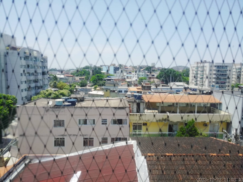 Apartamento à venda Taquara com 55m² e 2 quartos por R$ 160.000 - 1060093633-sala-janela.jpeg