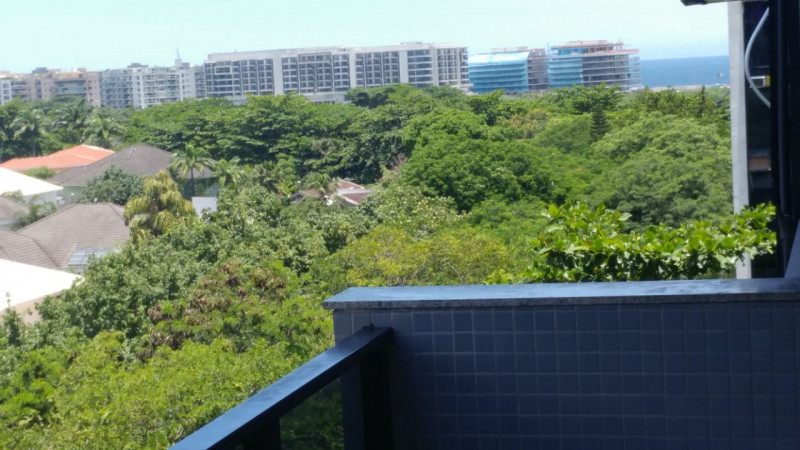 Apartamento à venda Barra da Tijuca com 127m² e 4 quartos por R$ 1.590.000 - 723025892-a-varanda-com-mar-ok-1.jpeg