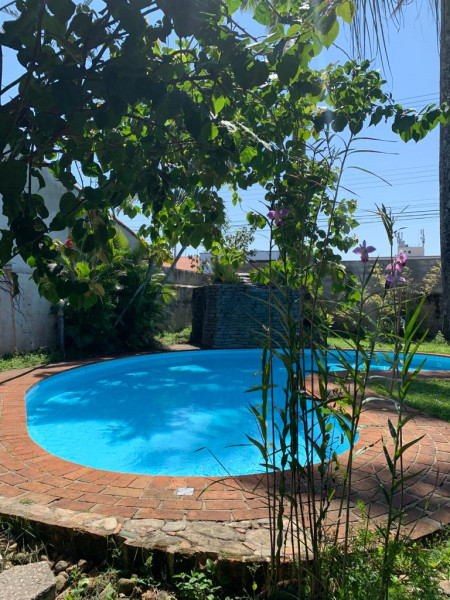 Casa à venda Bal Tres Marias com 390m² e 4 quartos por R$ 650.000 - 1880539031-piscina-vista-do-quintal.jpeg