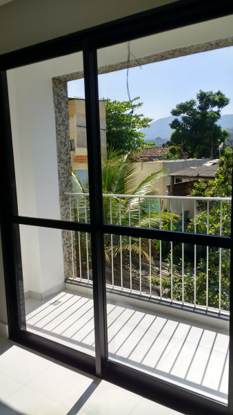 Apartamento à venda Taquara com 55m² e 2 quartos por R$ 220.000 - 965236291-varanda-1.jpg