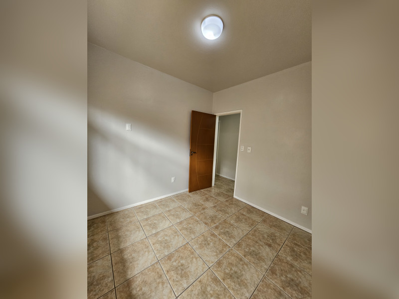 Casa à venda Forquilhas com 114m² e 3 quartos por R$ 620.000 - 11-quarto-01-vista-porta.jpg