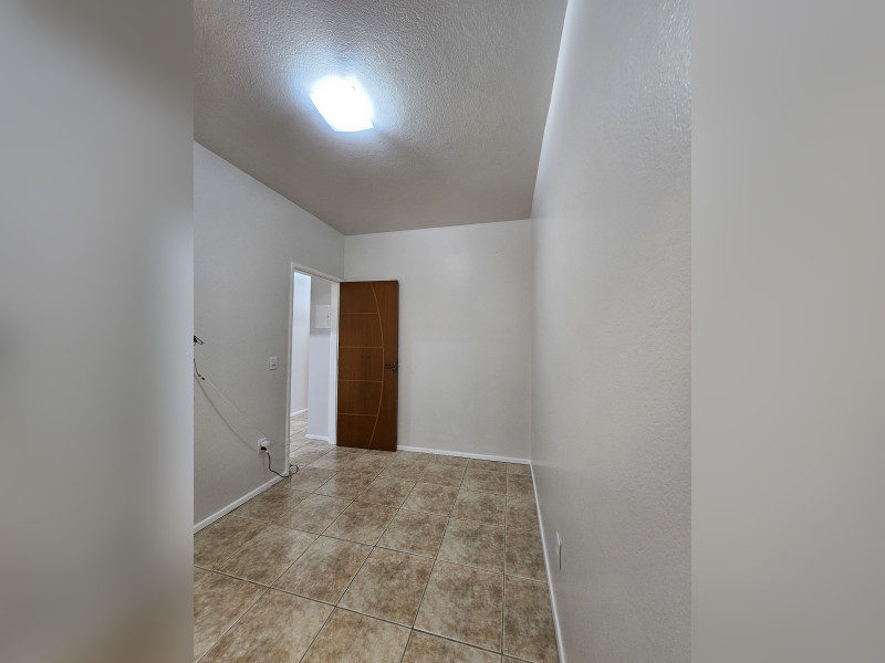 Casa à venda Forquilhas com 114m² e 3 quartos por R$ 620.000 - 12-quarto-2-vista-porta.jpg