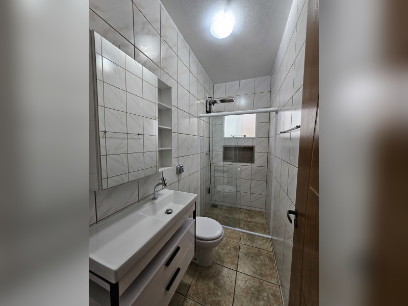 Casa à venda Forquilhas com 114m² e 3 quartos por R$ 620.000 - 14-banheiro-social.jpg