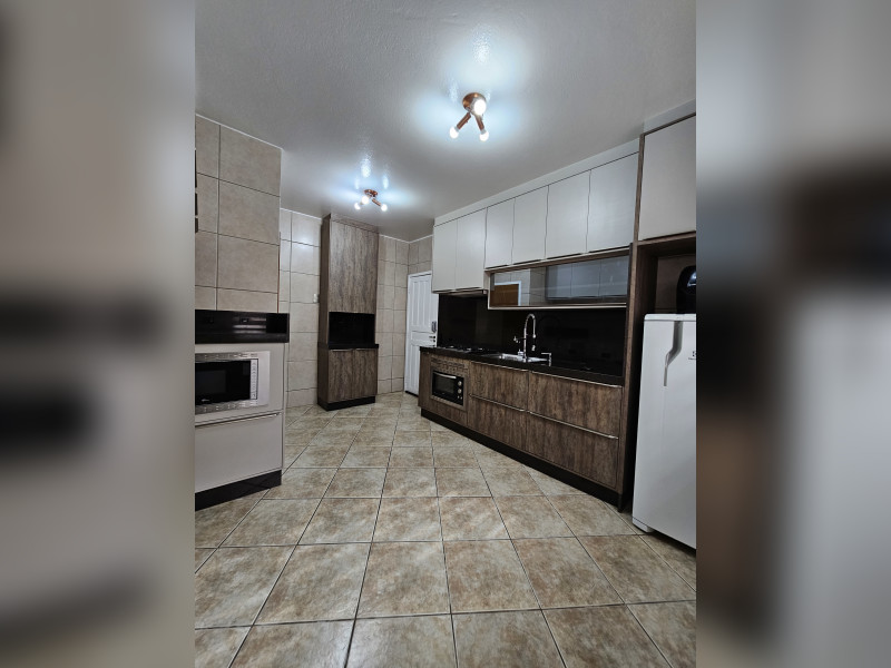 Casa à venda Forquilhas com 114m² e 3 quartos por R$ 620.000 - 191-cozinha-planejada.jpg