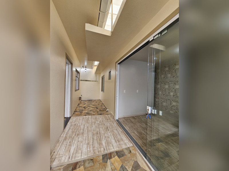 Casa à venda Forquilhas com 114m² e 3 quartos por R$ 620.000 - 231-entrada-area-de-servicos-e-escritorio.jpg