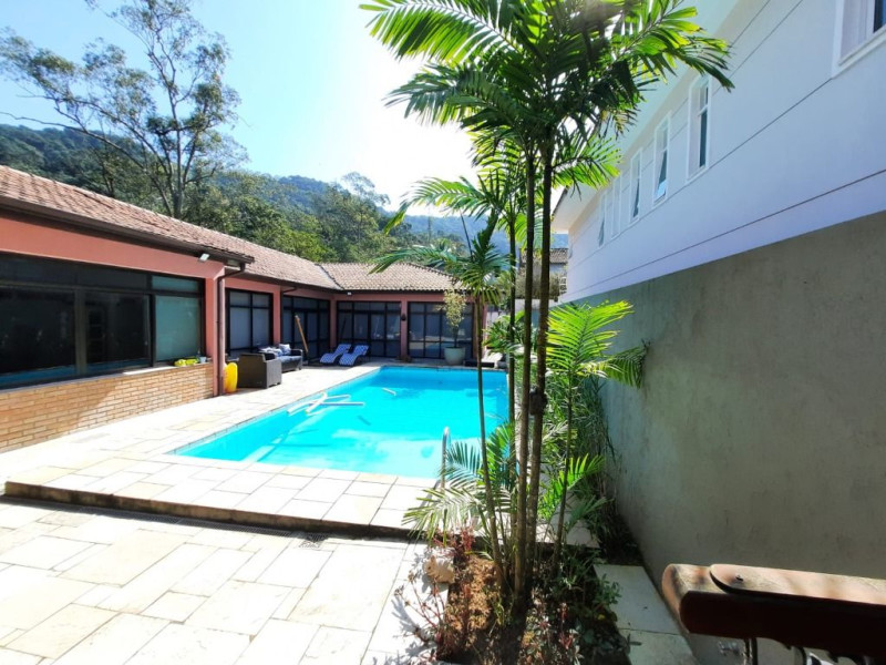 Casa de condomínio à venda Balneário Cidade Atlântica com 385m² e 4 quartos por R$ 1.495.000 - piscina-e-mata.jpg