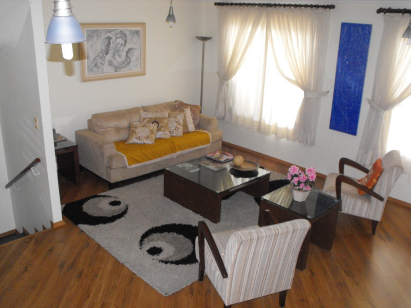 Casa de condomínio à venda Parque Munhoz com 220m² e 3 quartos por R$ 1.050.000 - 1006452592-4sala-de-estar-frontal.jpg