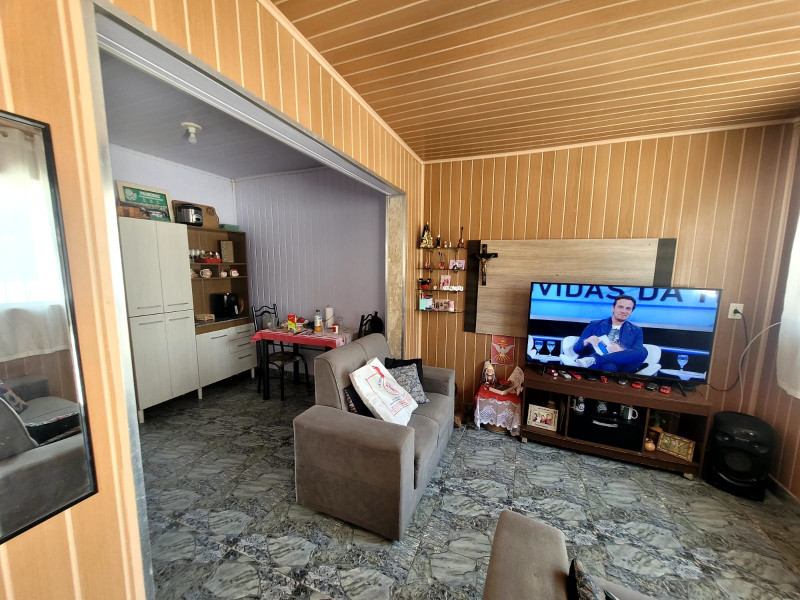 Casa à venda Jundiapeba com 205m² e 1 quarto por R$ 450.000 - 430871767-sala-de-estar.jpg