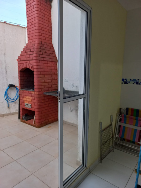 Casa de condomínio à venda Cibratel 2 com 88m² e 2 quartos por R$ 550.000 - 303997296-churrasqueira-privativa.jpeg