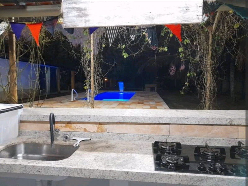 Casa de condomínio à venda Centro com 1200m² e 6 quartos por R$ 690.000 - 682127150-cozinha-externa.jpeg