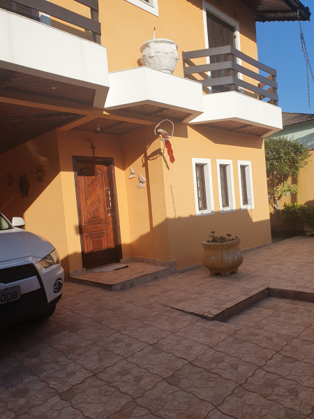 Casa à venda Canto do Forte com 340m² e 4 quartos por R$ 1.900.000 - 405181409-1-2-frente-da-casa-porta-principal.jpg