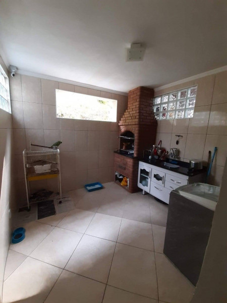 Casa de condomínio à venda Loteamento City Jaraguá com 65m² e 2 quartos por R$ 350.000 - 50268907-lavanderia-e-churrasqueira.jpg