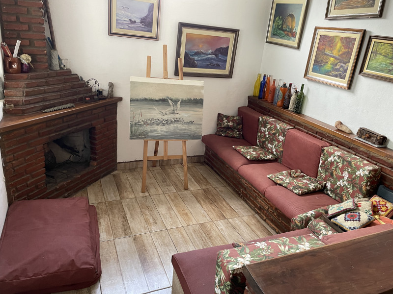 Casa à venda Bela Vista com 280m² e 5 quartos por R$ 980.000 - 384754709-sala-da-lareira.jpg