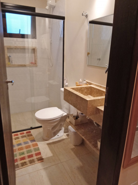 Casa de condomínio à venda Taipas De Pedras (Mailasqui) com 152m² e 3 quartos por R$ 1.300.000 - 1090705119-banheiro-social.jpg