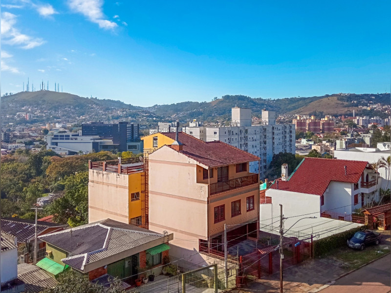 Apartamento à venda Medianeira com 105m² e 2 quartos por R$ 371.900 - efod1487201202508260929262-vista-patio-externo.jpg