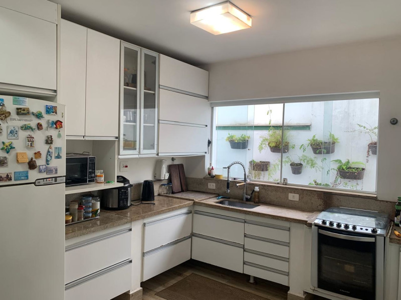 Casa de condomínio à venda jardim acapulco com 400m² e 6 quartos por R$ 2.700.000 - cozinha.jpg