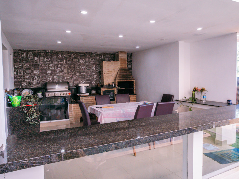 Casa à venda Chácara Pavoeiro com 549m² e 4 quartos por R$ 2.800.000 - area-de-lazer-churasqueira.jpg