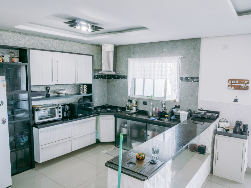 Casa à venda Chácara Pavoeiro com 549m² e 4 quartos por R$ 2.800.000 - casa-pav-superior-cozinha-integrada.jpg