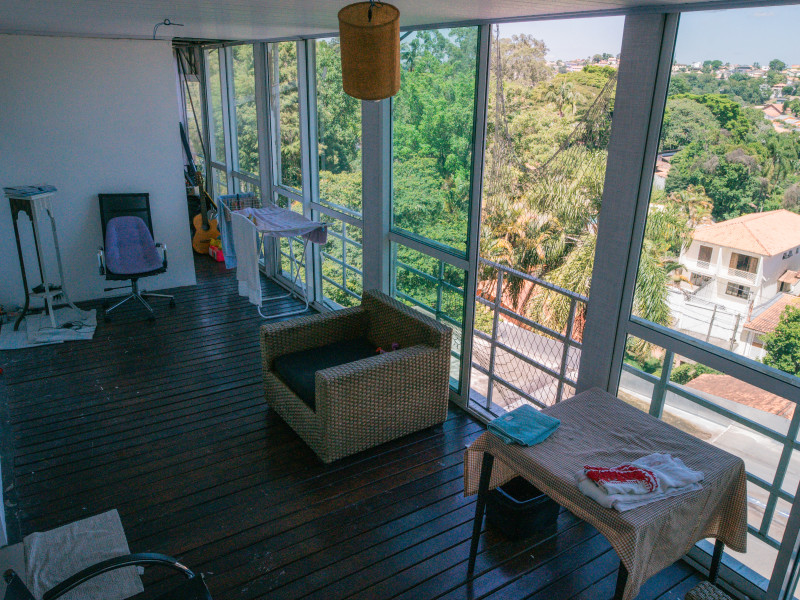 Casa à venda Chácara Pavoeiro com 549m² e 4 quartos por R$ 2.800.000 - casa-pav-superior-varanda-sala-jantar.jpg